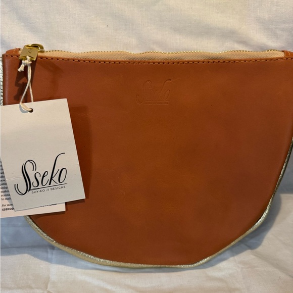 Sseko Handbags - Sseko Large Crescent Moon Clutch